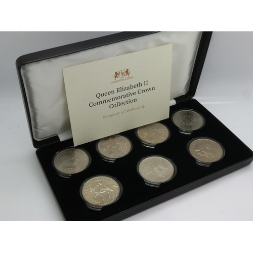 2218 - QEII seven-coin Commemorative Crown Collection, Harrington & Byrne, boxed with CoA. UK P&P Group 1 (... 