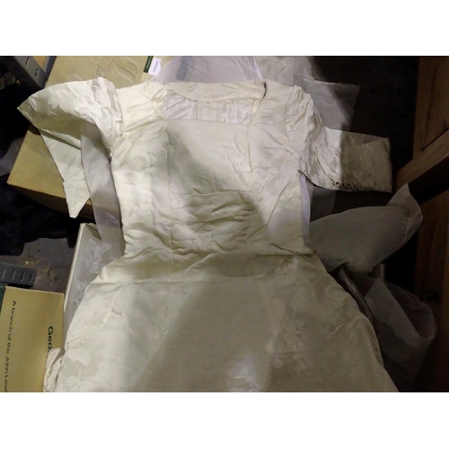 1037 - Two vintage wedding dresses from George Henry Lee, Liverpool, together with a veil, bust approx 30 c... 