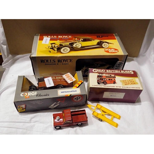 1048 - Rolls Royce Phantom II radio, boxed, a Corgi truck and an unboxed Landrover and trailer. Not availab... 