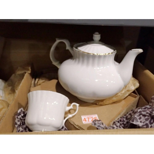 1054 - New boxed teaset with teapot. Not available for in-house P&P