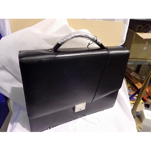 1073 - Planet black leather briefcase with dustbag. Not available for in-house P&P