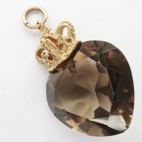 11 - 9ct gold mounted smokey quartz pendant, H: 32 mm, 6.7g. UK P&P Group 0 (£6+VAT for the first lot and... 