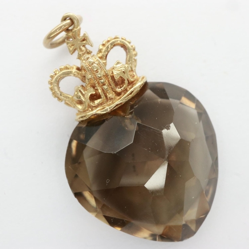 11 - 9ct gold mounted smokey quartz pendant, H: 32 mm, 6.7g. UK P&P Group 0 (£6+VAT for the first lot and... 