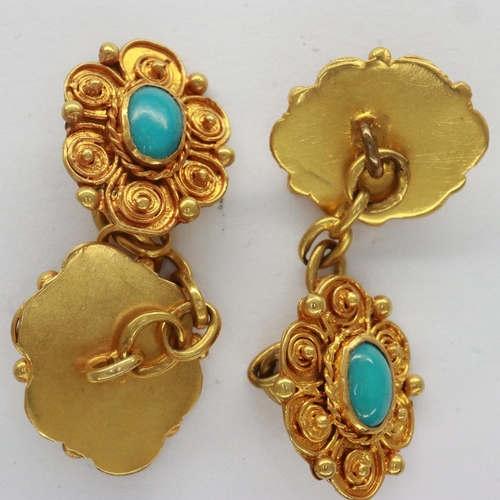 13 - Pair of yellow metal cufflinks set with turquoise cabochons, 7.1g. UK P&P Group 0 (£6+VAT for the fi... 