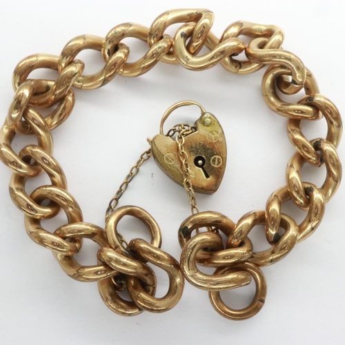 15 - Yellow metal heavy gauge bracelet with rolled gold padlock clasp, L: 18 cm, 45g. UK P&P Group 0 (£6+... 