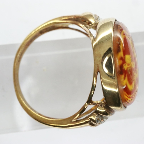 50 - 9ct gold ring set with carved amber and diamond shoulders, size Q, 4.2g. UK P&P Group 0 (£6+VAT for ... 