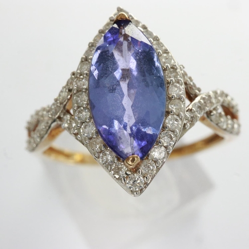 9 - 9ct gold ring set with marquise cut tanzanite and diamonds, size R, 2.6g. UK P&P Group 0 (£6+VAT for... 