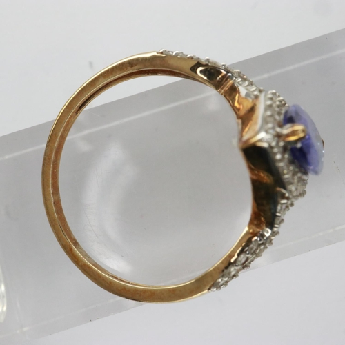 9 - 9ct gold ring set with marquise cut tanzanite and diamonds, size R, 2.6g. UK P&P Group 0 (£6+VAT for... 