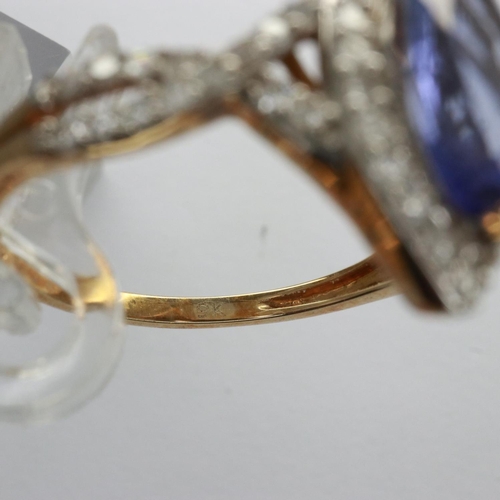 9 - 9ct gold ring set with marquise cut tanzanite and diamonds, size R, 2.6g. UK P&P Group 0 (£6+VAT for... 