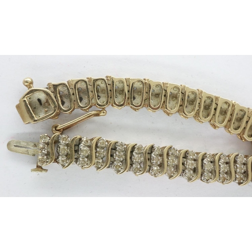 87 - 9ct gold bracelet set with diamonds, L: 18 cm, 14.3g, clasp works, would benefit from a clean, does ... 