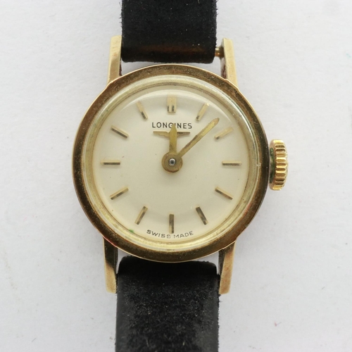 92 - LONGINES: ladies 9ct gold cased wristwatch on a black leather strap, working at lotting, boxed. UK P... 