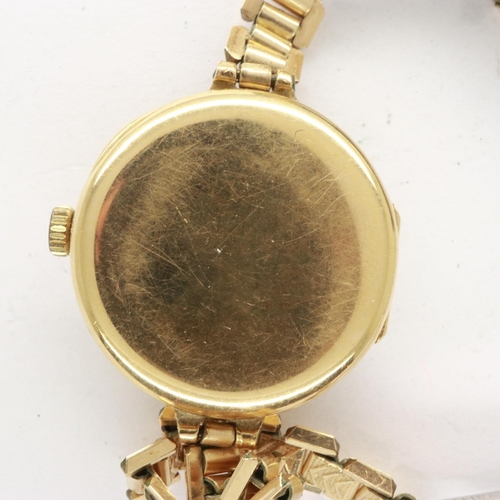 99 - ARIES: ladies 18ct gold cased, 17 jewel wristwatch on a rolled gold bracelet, 21.4g, not working at ... 