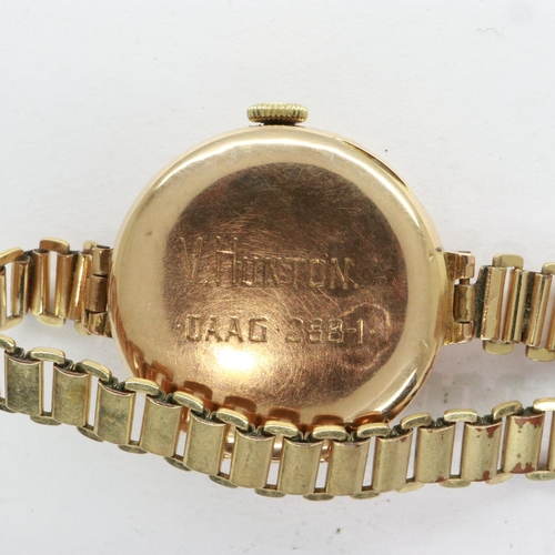 102 - Ladies 9ct gold 15 jewel wristwatch on a yellow metal bracelet, inscribed 9ct, total 21.1g, not work... 