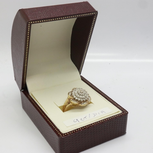 69 - 9ct gold cluster ring set with diamonds, size O/P, 4.8g. UK P&P Group 0 (£6+VAT for the first lot an... 