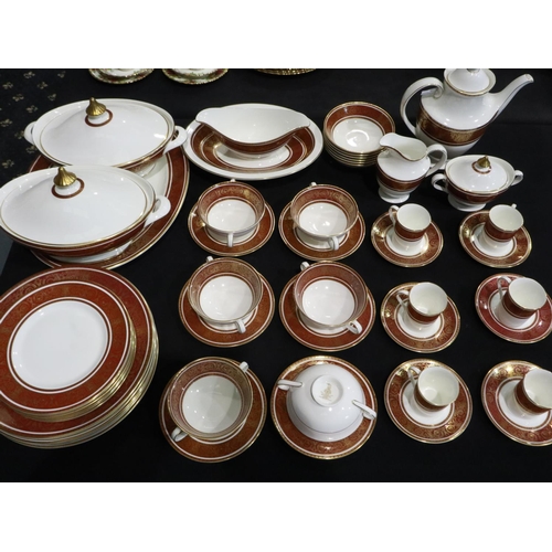 207 - Substantial Royal Doulton tea and dinnerware in the Buckingham pattern of fifty pieces, claret and g... 