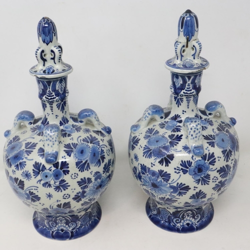 227 - Pair of Delft covered blue and white decanters, damage to lids, H: 26 cm. UK P&P Group 2 (£20+VAT fo... 