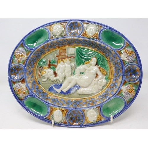 230 - Minton Majolica style oval dish, restoration to base, pitting and crazing throughout, L: 25 cm. UK P... 