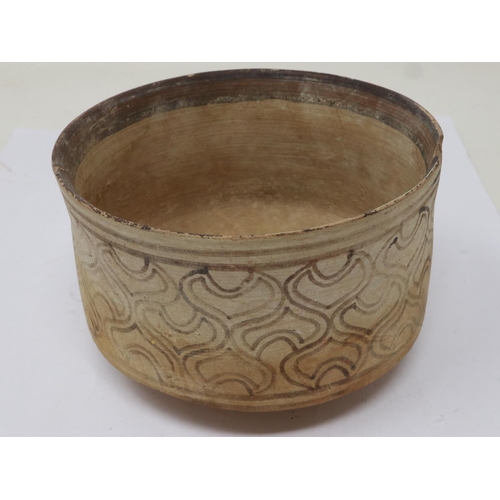 179 - Indus Valley Neolithic period footed bowl, D: 10 cm, damages to the rim and discolouration throughou... 