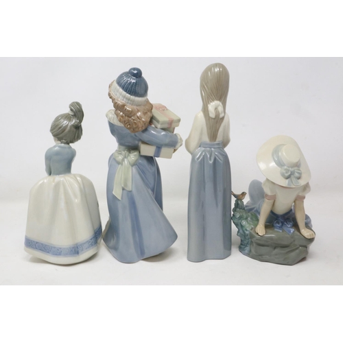 204 - Four Nao figurines, no cracks or chips, largest H: 22 cm. UK P&P Group 2 (£20+VAT for the first lot ... 