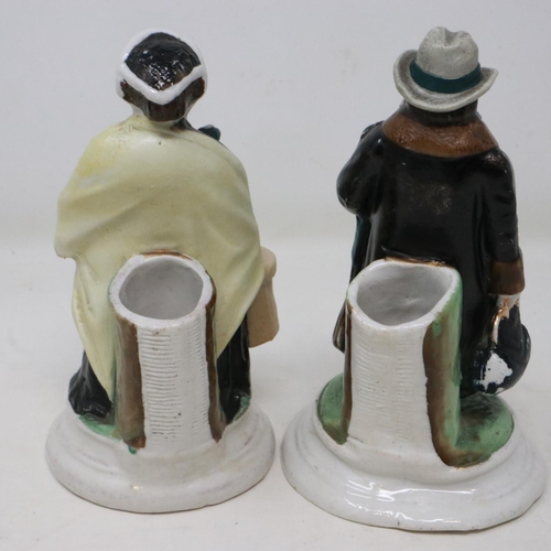 246 - Two Victorian ceramic spill holders in the form of a man and woman, signs of age and slight losses t... 