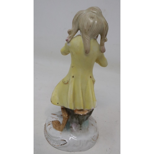 264 - Figurine after The Meissen monkey band, H: 10 cm, signs of age throughout. UK P&P Group 1 (£16+VAT f... 