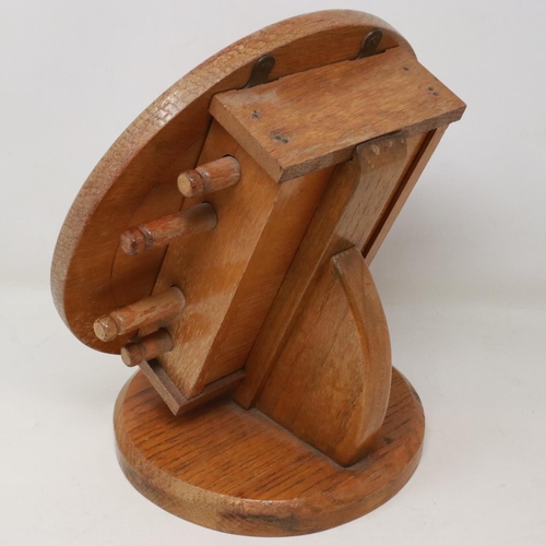 298 - Golden oak cased perpetual calendar with day, date and month, appears to be in working order, H: 27 ... 