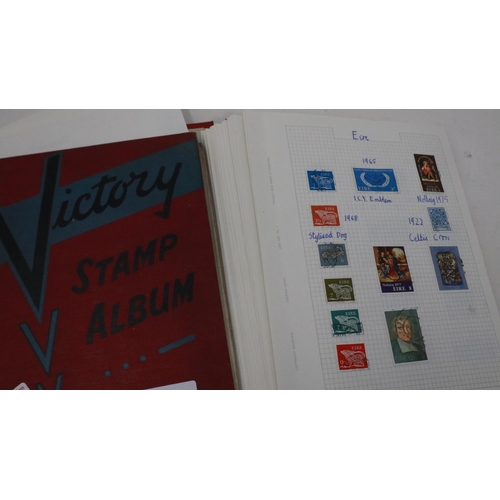 334 - Two stamp albums including George V London postmarks. UK P&P Group 2 (£20+VAT for the first lot and ... 