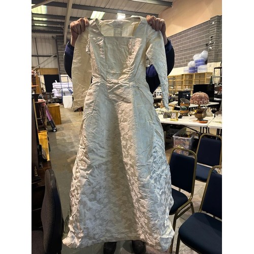 1037 - Two vintage wedding dresses from George Henry Lee, Liverpool, together with a veil, bust approx 30 c... 