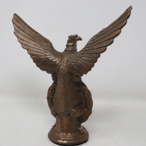 2044 - Third Reich brass desk eagle, surmounted with an original 3-part construction Iron Cross with an iro... 