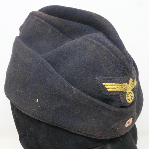 2079 - WWII German Kriegsmarine side cap with insignia of the U-858 Which surrendered at Delaware, USA on t... 