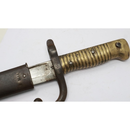 2144 - A French 19th century M1866 chassepot sword bayonet with hooked quillon and metal scabbard, dated 18... 