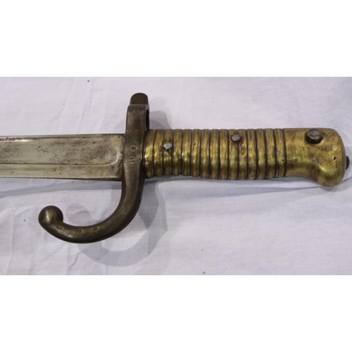 2146 - A French 19th century M1866 chassepot sword bayonet with hooked quillon and metal scabbard, dated 18... 