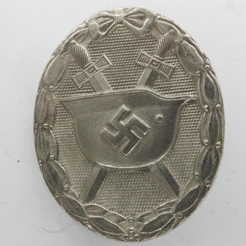 2178 - WWII German silver grade wound badge. marked L/56 for Robert Hauschild, Pforzheim. UK P&P Group 1 (£... 