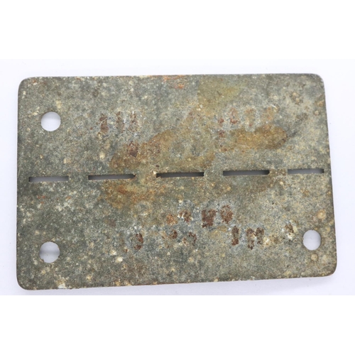 2194 - WWII German issued Prisoner of War dog tag from Stalag III C, a camp for Allied soldiers. near the v... 