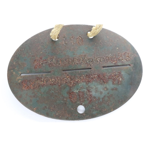 2195 - WWII German Waffen SS dog tag with replacement string. UK P&P Group 1 (£16+VAT for the first lot and... 