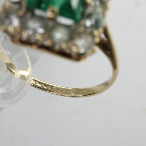 10 - 18ct gold ring set with a princess cut emerald surrounded by white topaz, size J, 1.5g. UK P&P Group... 