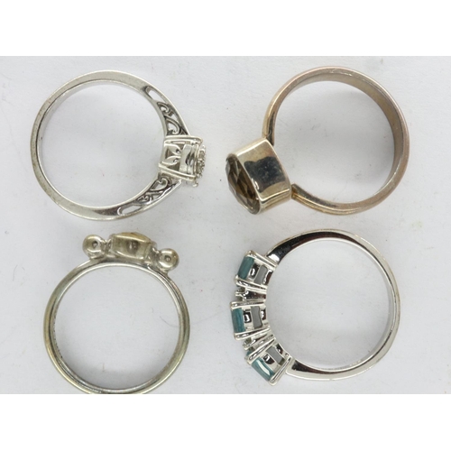 9 - Four mixed silver rings including TGGC 925 silver, all stone set, one with diamonds, mixed sizes. UK... 