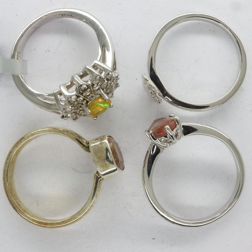 54 - Four mixed Gemporia and TGGC 925 silver rings, mostly stone set, mixed sizes. UK P&P Group 0 (£6+VAT... 