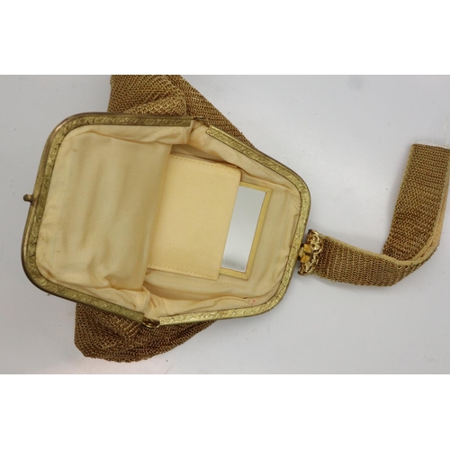 142 - Gold coloured mesh evening bag, containing original mirror, 15 x 15 cm. UK P&P Group 1 (£16+VAT for ... 