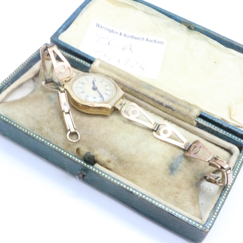 86A - 9ct gold cased ladies wristwatch on a 9ct gold bracelet, total 13.5g, not working at lotting. UK P&P... 