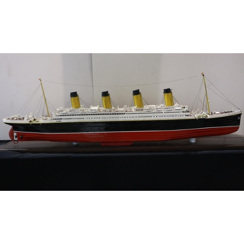 282 - Scratch built model of The Titanic (named Olympic) in a perspex case, overall L: 112 cm. Not availab... 