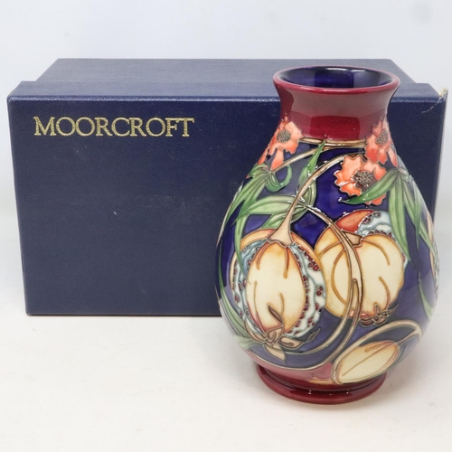 208 - Red ground Moorcroft vase in the Plevriana pattern, no cracks or chips, H: 20 cm, boxed. UK P&P Grou... 