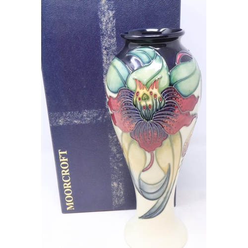 215 - Cream ground Moorcroft vase in the Anna Lilly pattern, no cracks or chips, H: 28 cm, boxed. UK P&P G... 