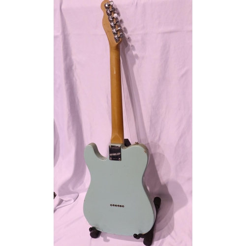 285 - Squier by Fender electric guitar, serial number YN764264, in poor condition. Not available for in-ho... 