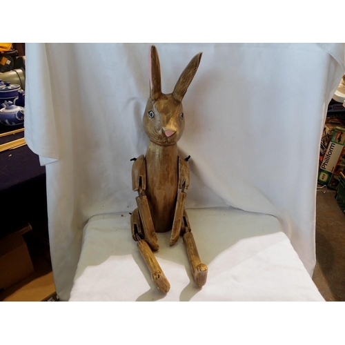 1195 - Wooden shelf rabbit, with damages to one ear. H: 60 cm. Not available for in-house P&P