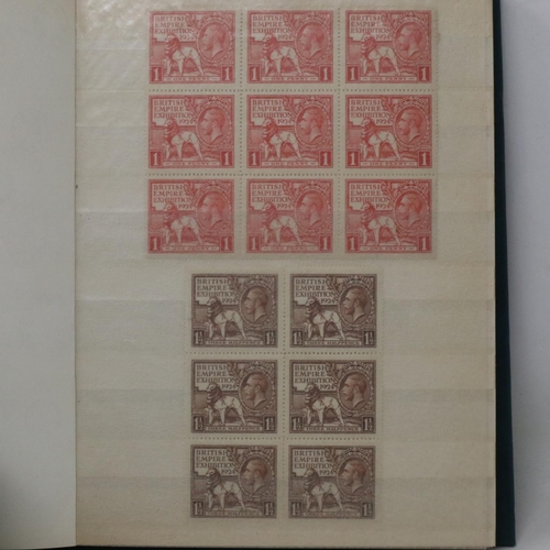 322 - Small stamp album containing blocks of 1924 British empire stamps, 1935 silver jubilee of George V a... 