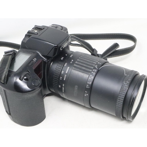 387 - Canon EOS 10 camera with Sigma lens. UK P&P Group 2 (£20+VAT for the first lot and £4+VAT for subseq... 