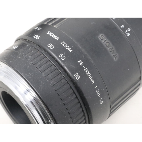 387 - Canon EOS 10 camera with Sigma lens. UK P&P Group 2 (£20+VAT for the first lot and £4+VAT for subseq... 