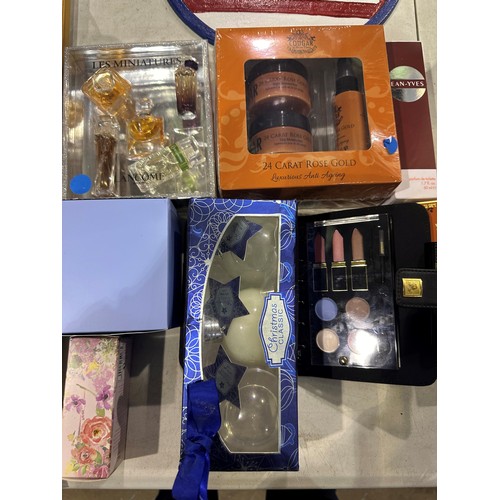 1295 - Quantity of mixed perfumes and cosmetics, including Cougar. Not available for in-house P&P