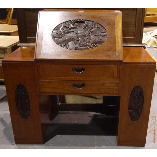 2065 - A Chinese carved hardwood fall-front bureau with fitted interior, two side cupboards and two drawers... 